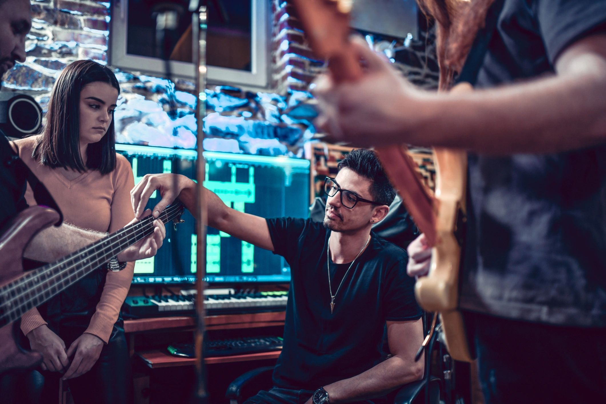 musicians collaborating in studio